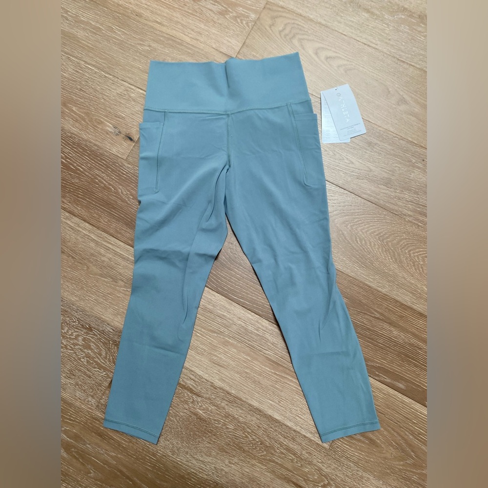 Athleta Salutation Stash Pocket II 7/8 Tight - size M - NWT